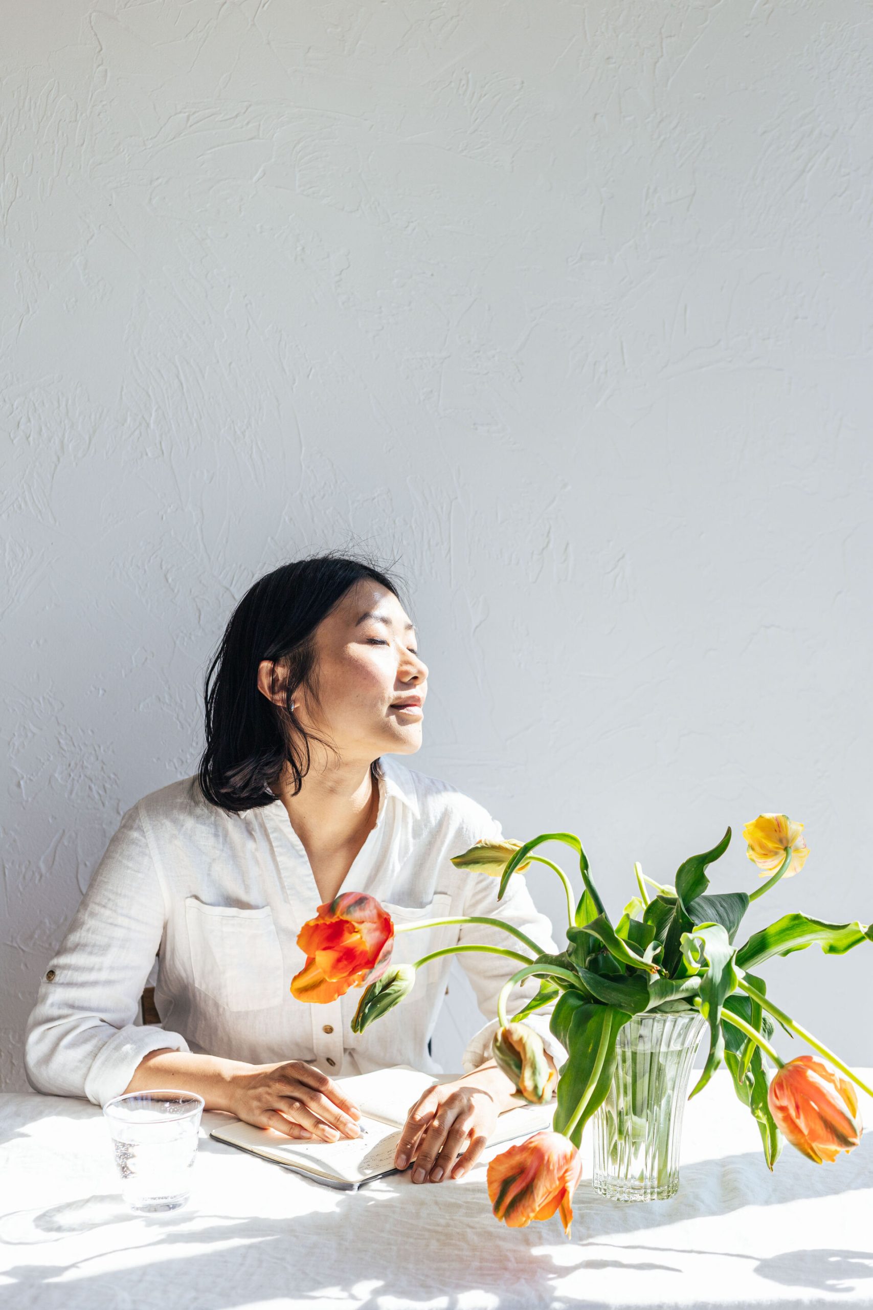 Young women meditating with eyes closed